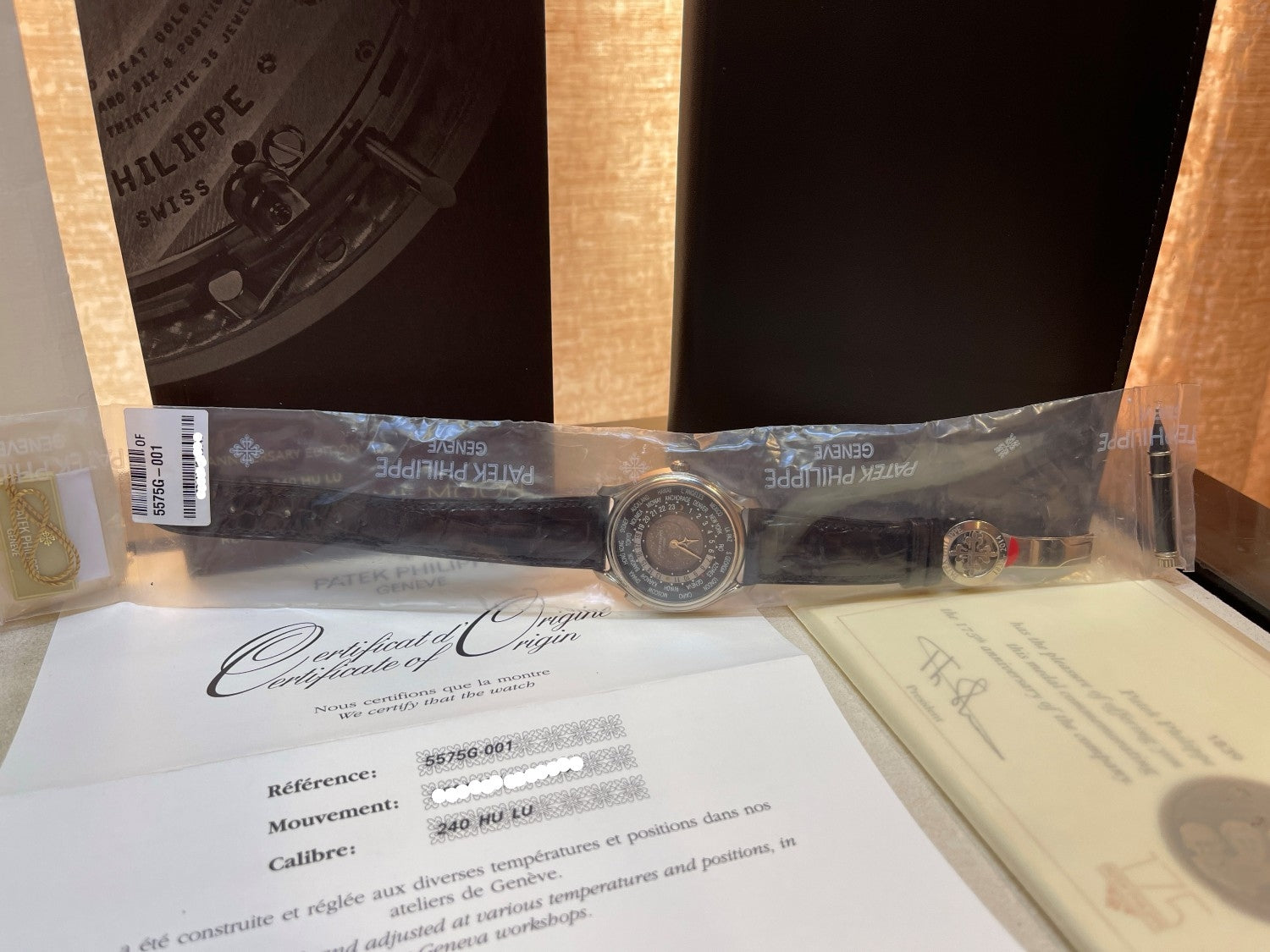 Patek Philippe 175th Anniversary World Timer White Gold Alligator Strap 5575G-001 V27N5U - Beverly Hills Watch Company Watch Store