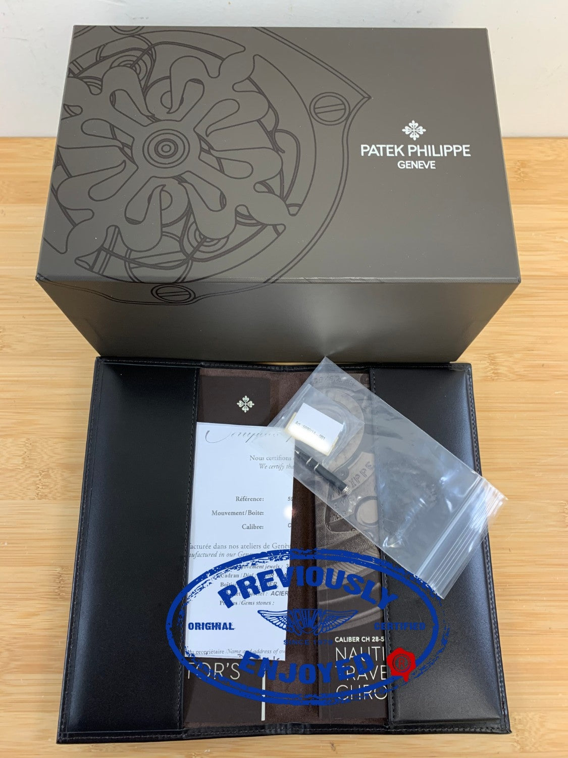 Patek Philippe Nautilus Travel Time Chronograph Stainless Steel Black Dial 5990/1A-001 Q63J53