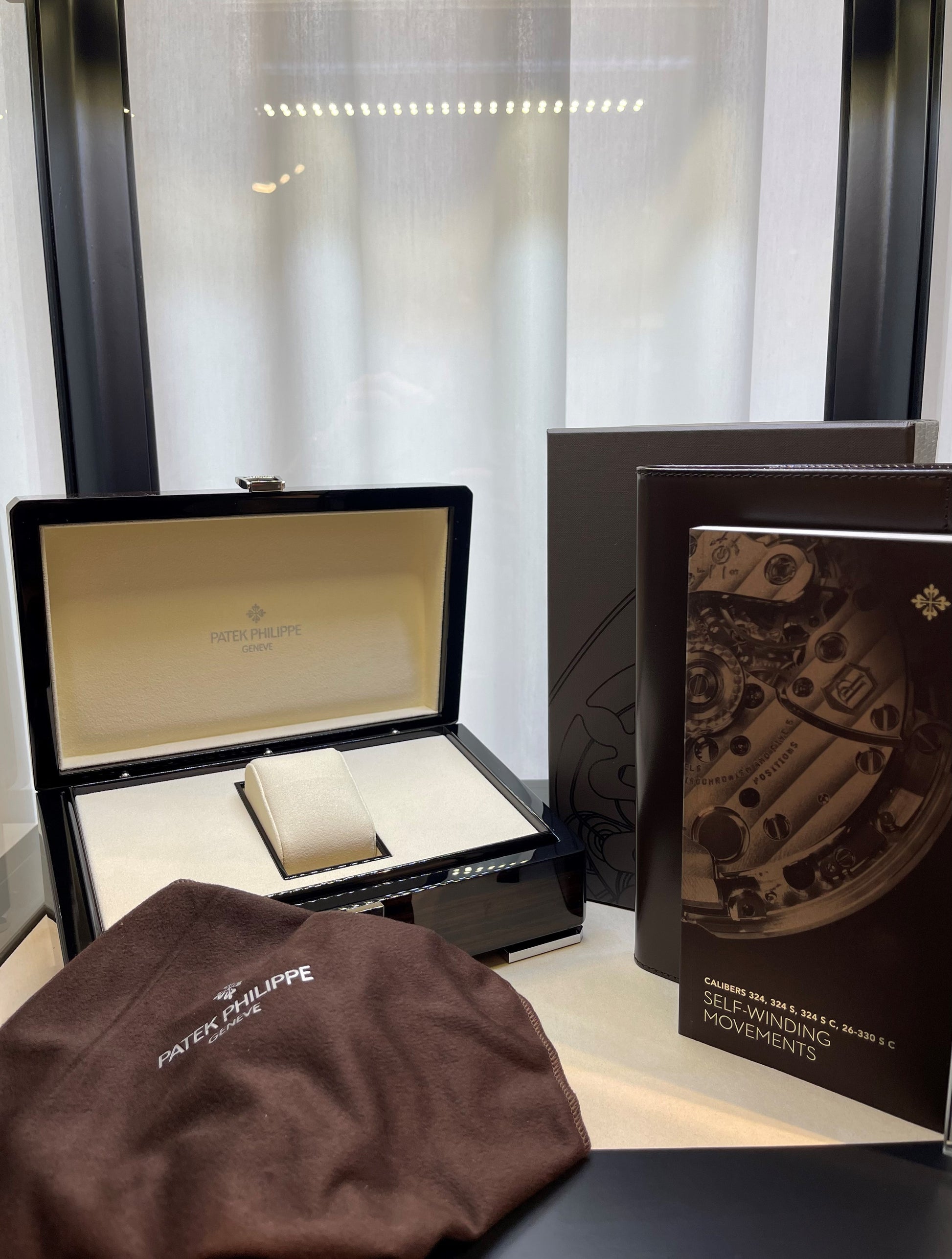 Patek Philippe Aquanaut Jumbo 42.2mm White Gold Khaki 5168g-010 - Beverly Hills Watch Company