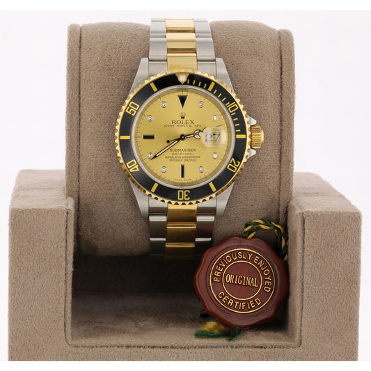 Rolex Submariner Steel and Yellow Gold Champagne Serti Diamond Dial 16613