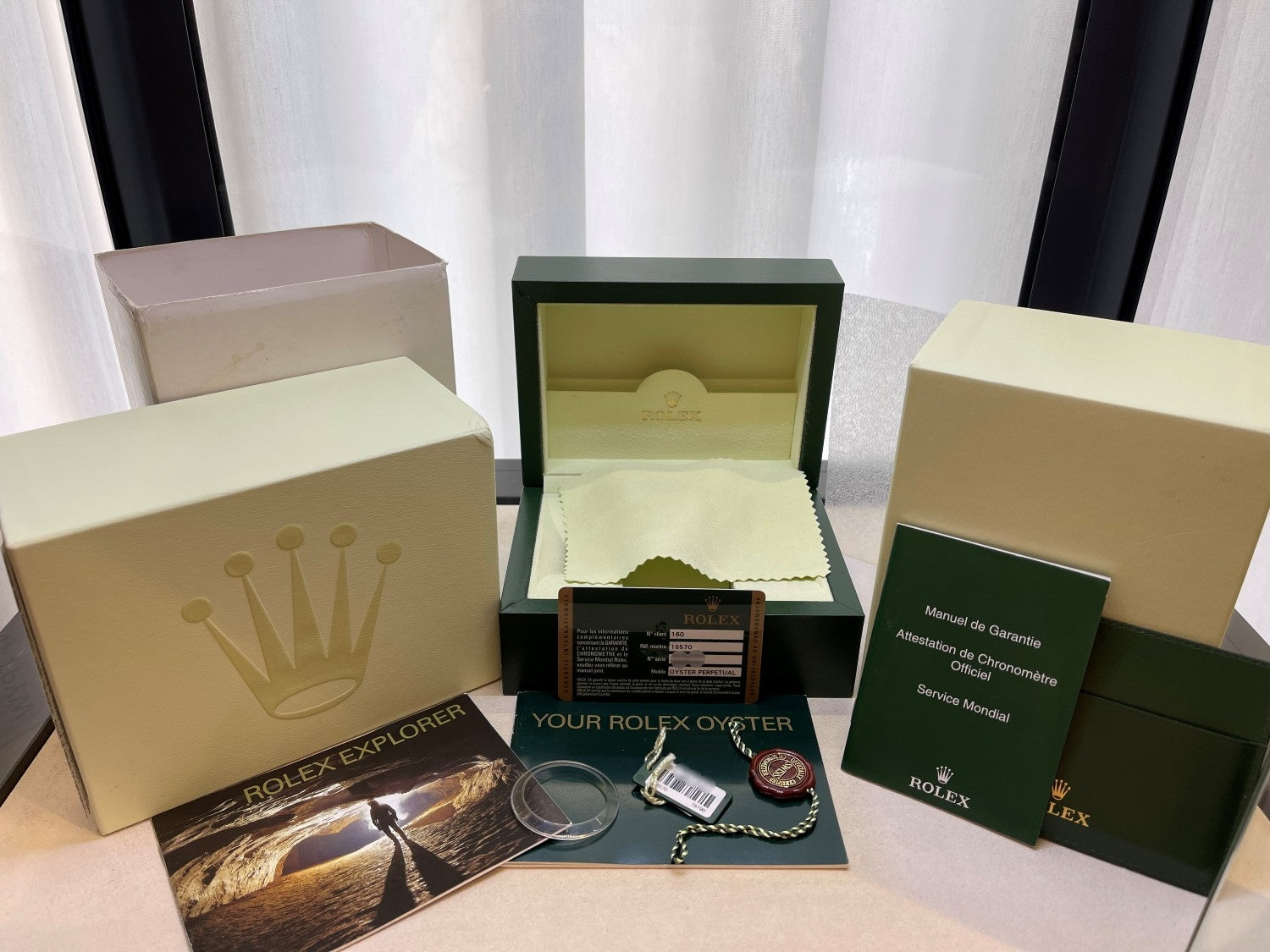 Rolex Explorer II 40mm Stainless Steel White Dial 16570 - Beverly Hills Watch Company