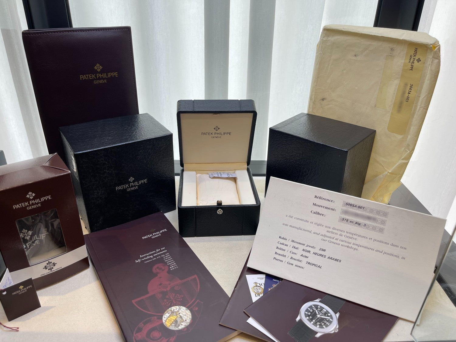 Patek Philippe Aquanaut Jumbo Stainless Steel 5065A - Beverly Hills Watch  Company