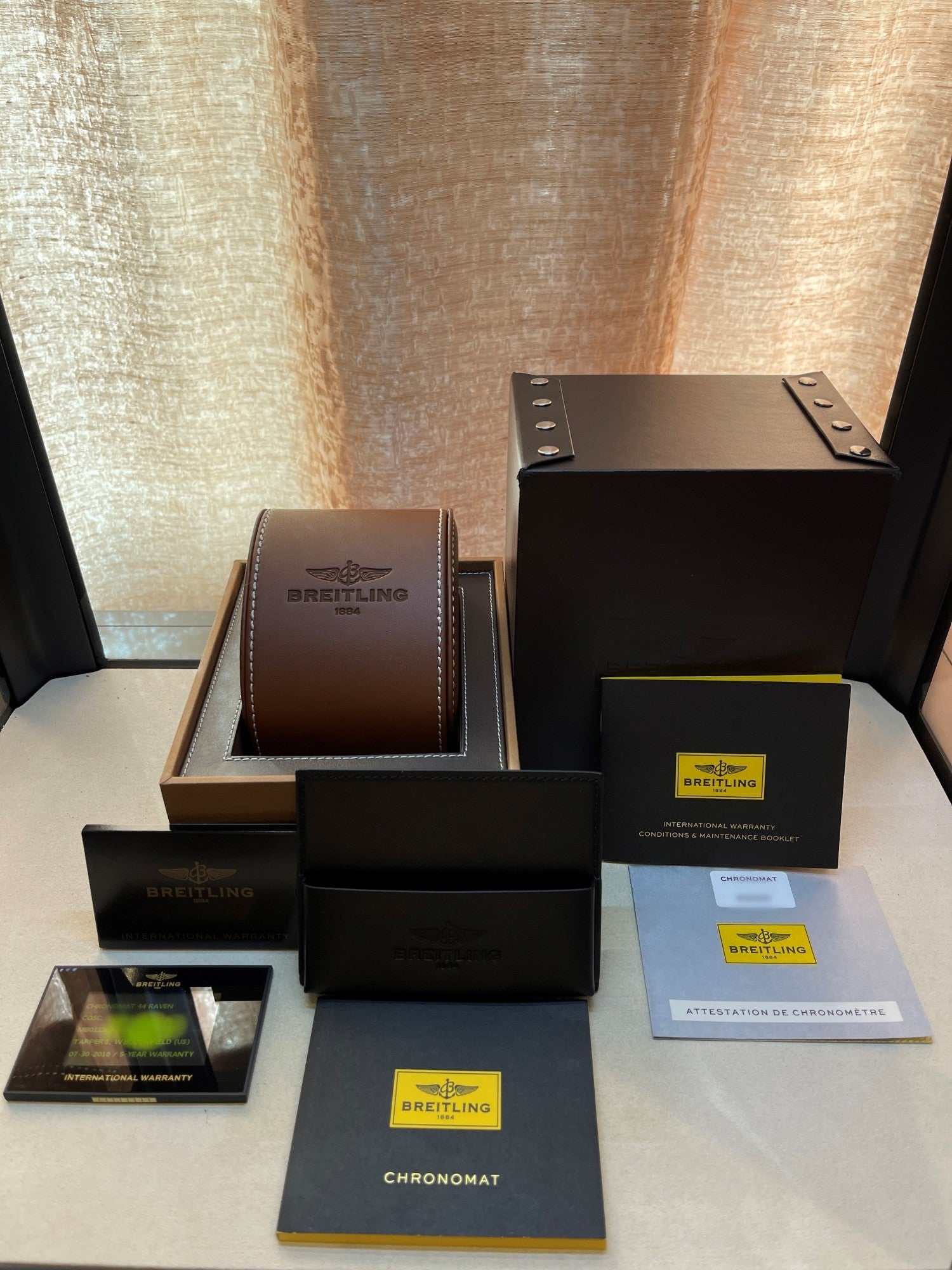 Breitling Chronomat 44mm Raven Blacksteel MB0111C2/BD07/153S - Beverly Hills Watch Company