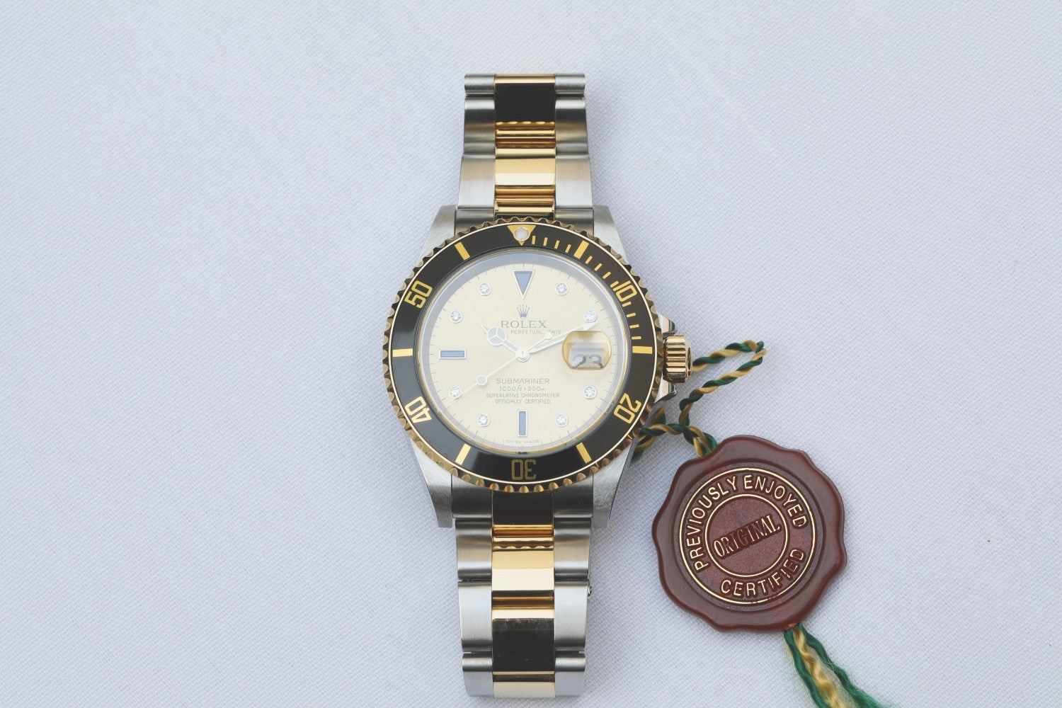 Rolex Submariner Steel and Yellow Gold Champagne Serti Diamond Dial 16613 FHUNCN - Beverly Hills Watch Company