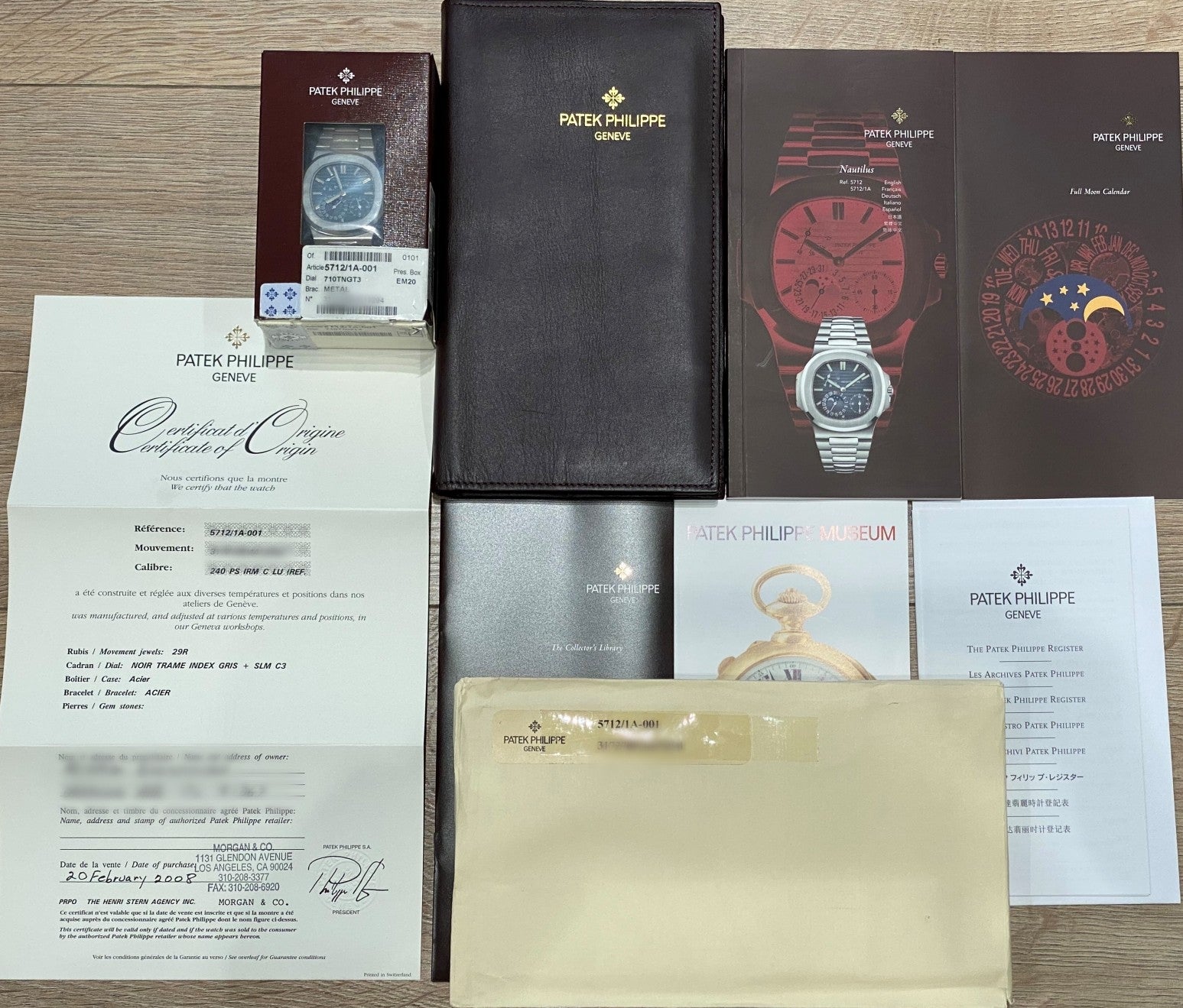 Patek Philippe Nautilus Power Reserve Moon Phases Blue Dial 5712/1a-001 - Beverly Hills Watch Company