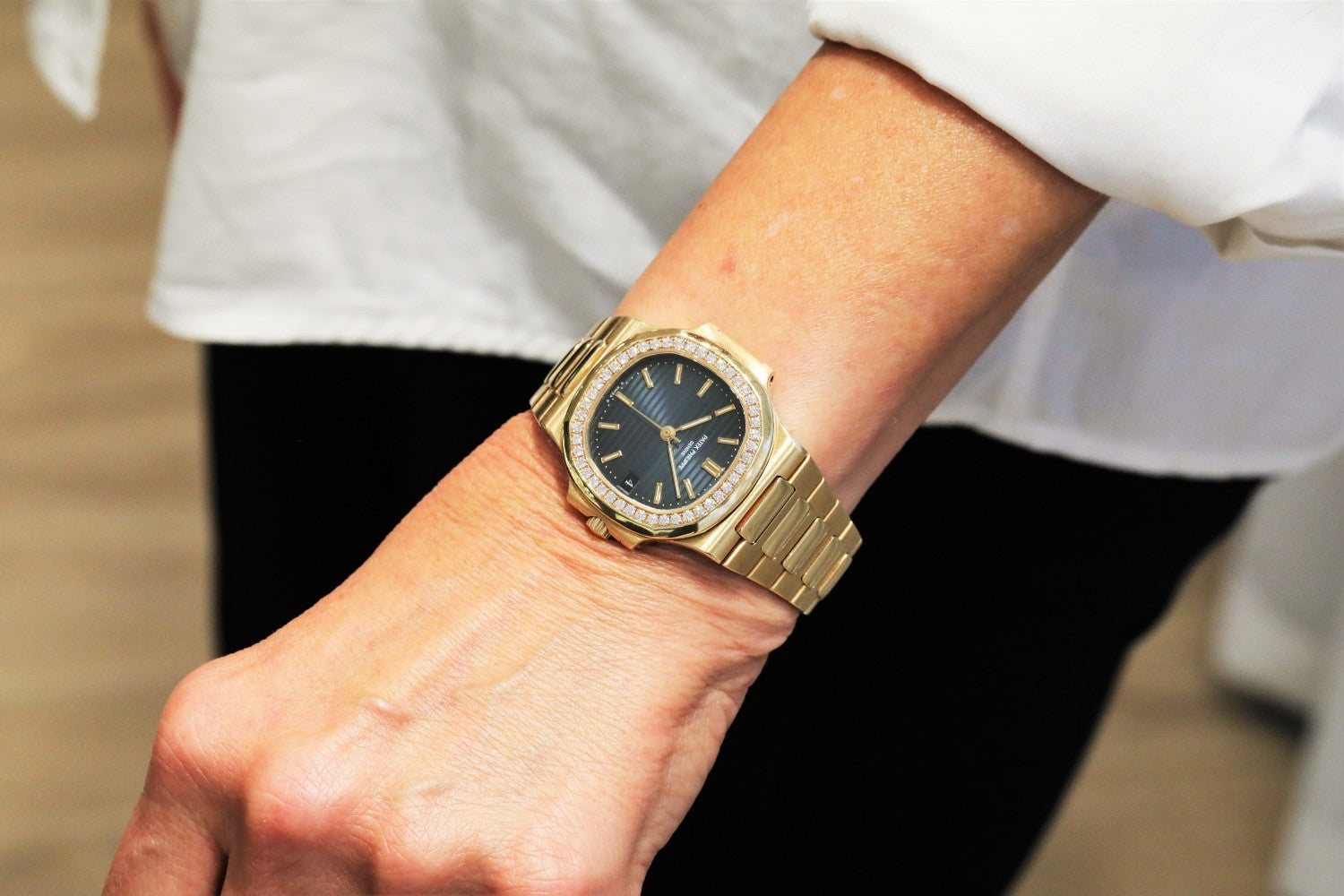 Patek Philippe Nautilus Diamond Bezel Yellow Gold Blue Dial 3800/1J - Beverly Hills Watch Company