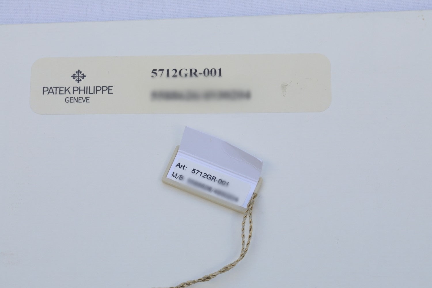 Patek Philippe Nautilus Rose Gold and Stainless Power Reserve Moon Dial 5712GR-001 - Beverly Hills Watch Company