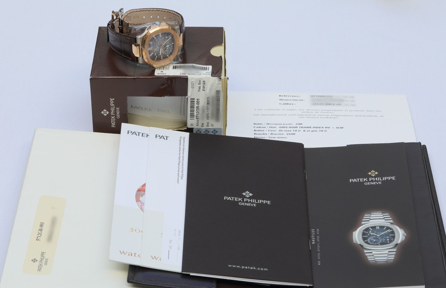 Patek Philippe Nautilus Rose Gold and Stainless Power Reserve Moon Dial 5712GR-001 - Beverly Hills Watch Company