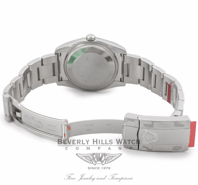 Rolex Oyster Perpetual Date 34mm 18k White Gold Fluted Bezel Black Dial 115234 - Beverly Hills Watch Company Watch Store