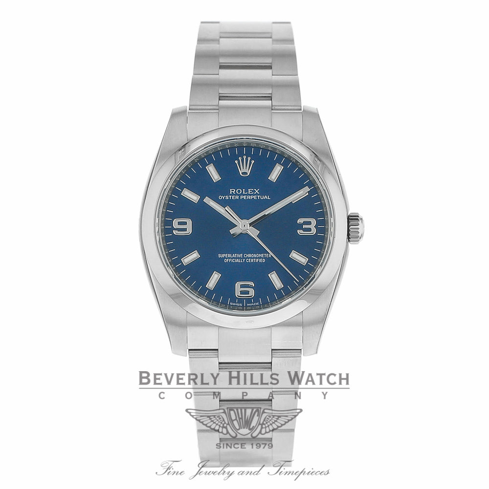 Rolex Oyster Perpetual Domed Bezel 34mm Blue Dial 114200 017W7A - Beverly Hills Watch