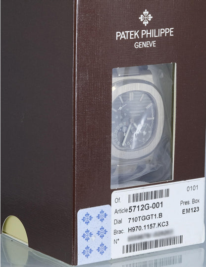 Patek Philippe Nautilus White Gold Power Reserve Moon Date 5712g-001 - Beverly Hills Watch Company