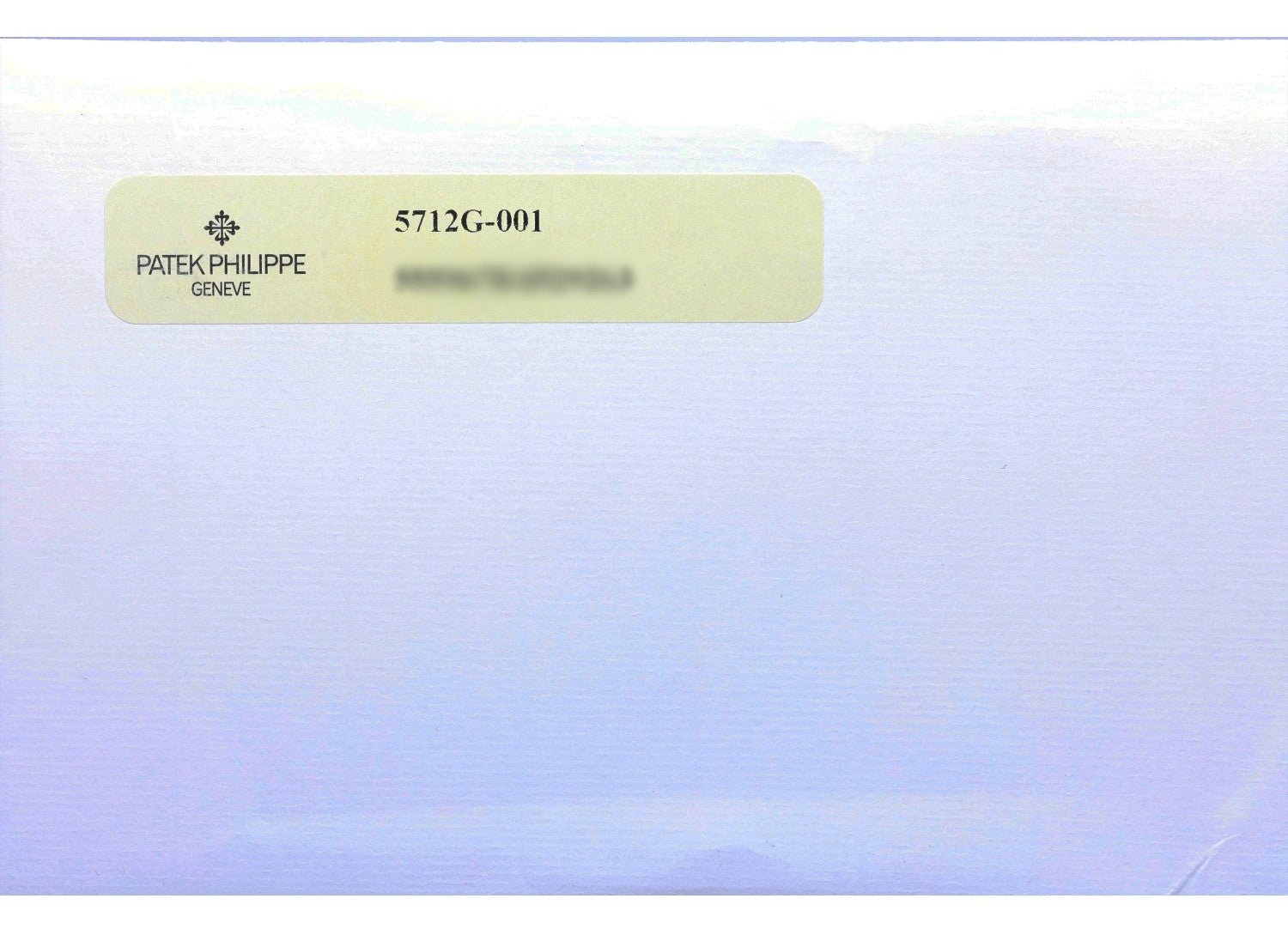 Patek Philippe Nautilus White Gold Power Reserve Moon Date 5712g-001 - Beverly Hills Watch Company